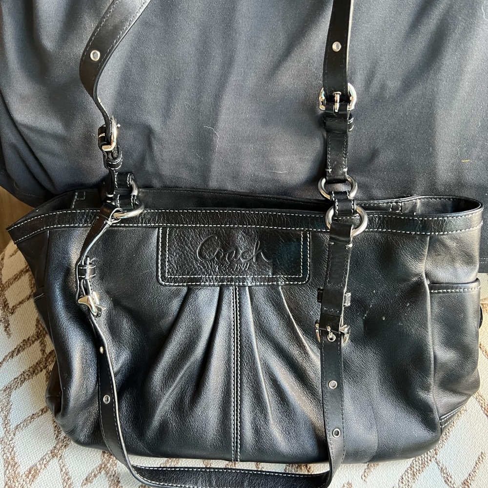 Coach, black leather tote and matching wallet and coin purse